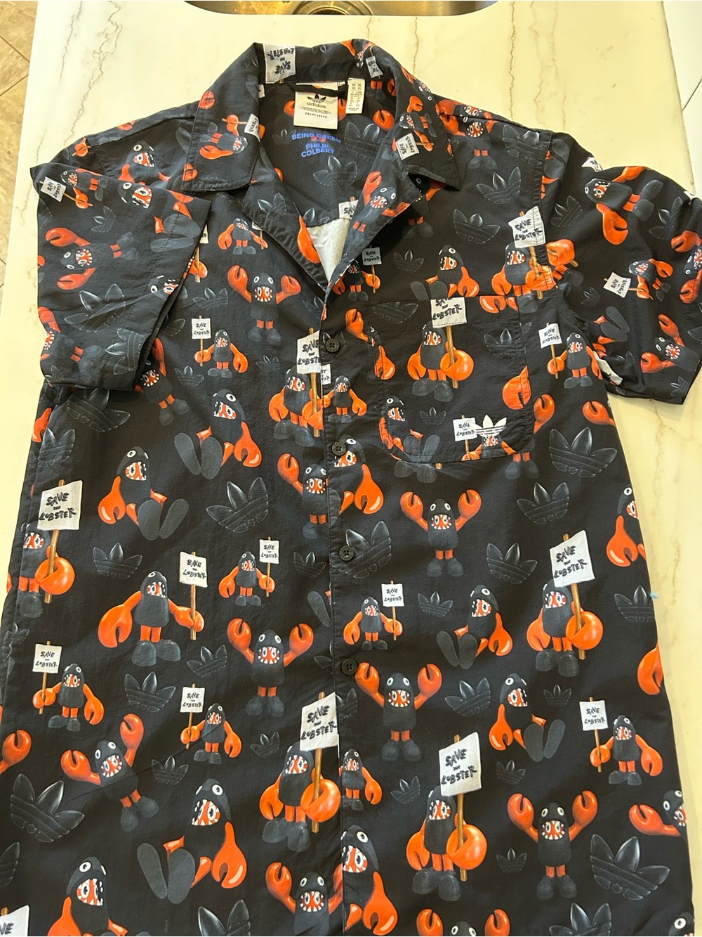 Adidas Men’s Philip Colbert “Save the Lobster” button down. Size XS